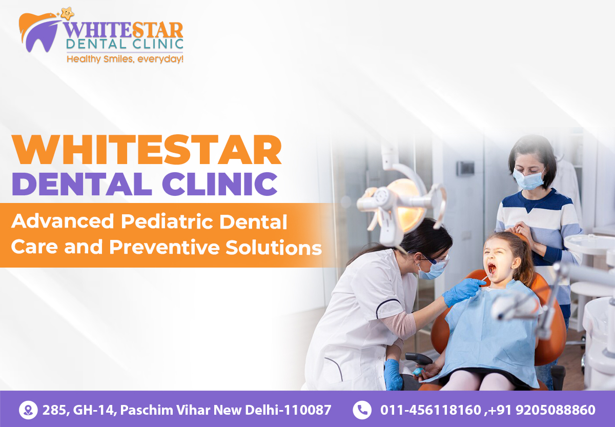 Dentist checking kids teeth in white star dental clininc.